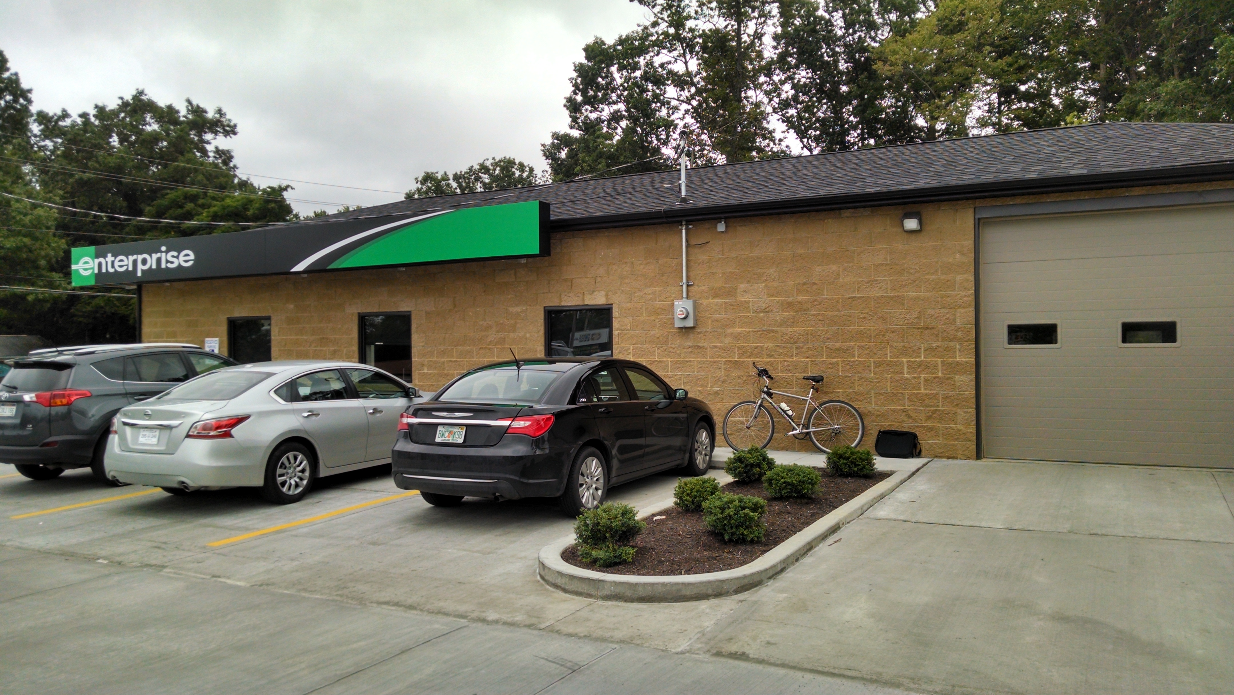 Renting a car the next day. (Notice my bike.)