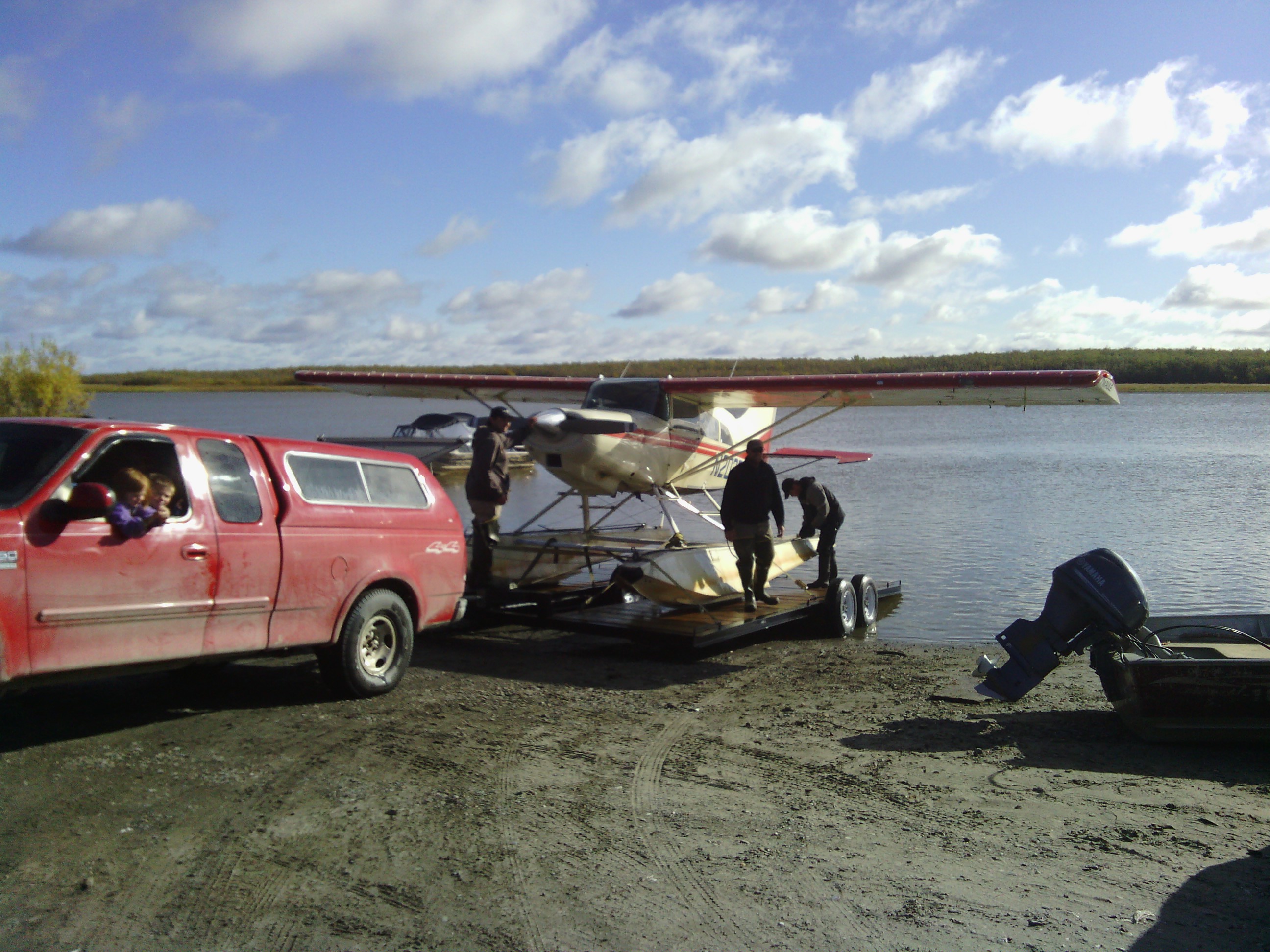 Pulling the plane out to put it on wheels for the winter