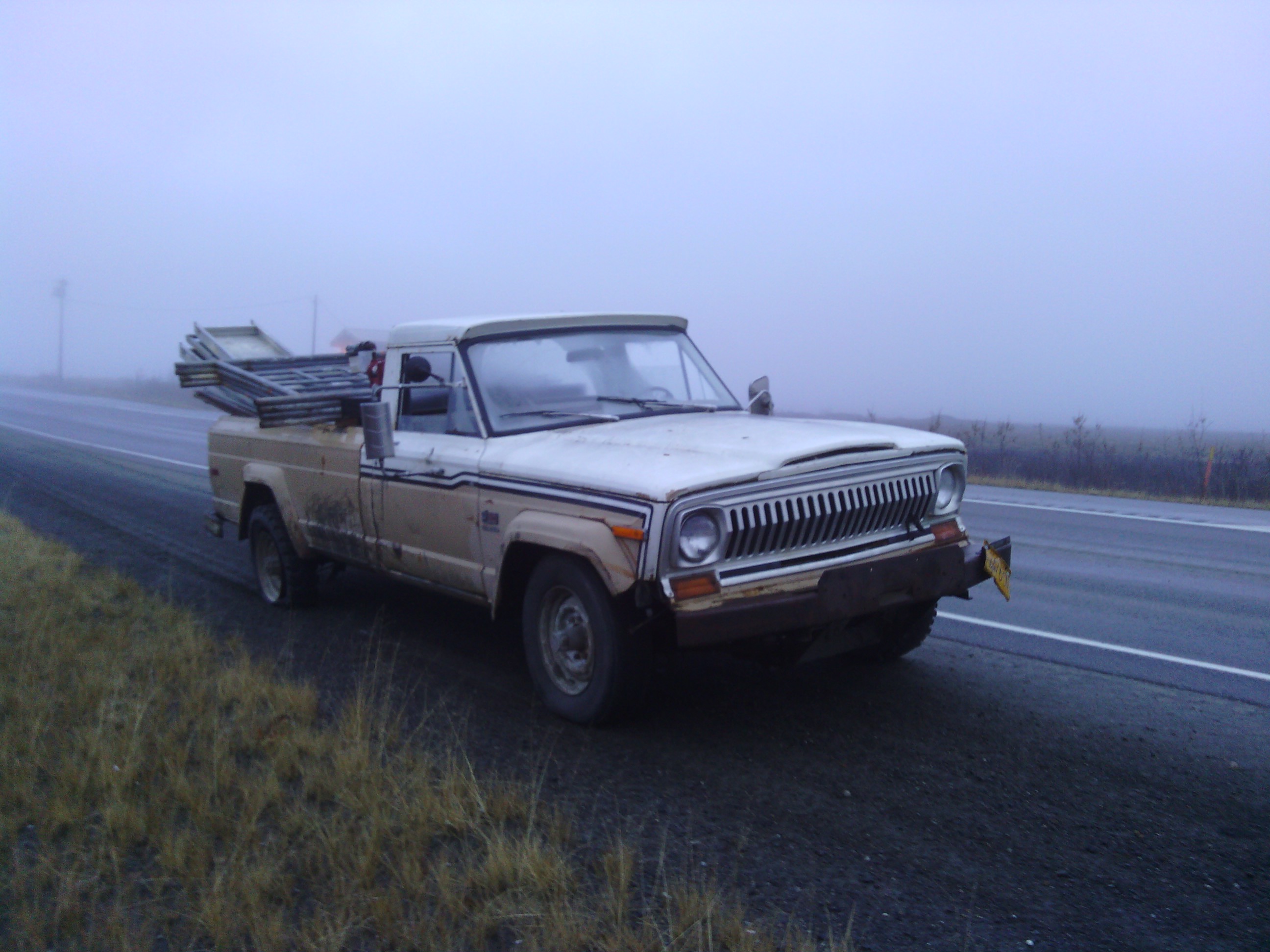 The Jeep J20 after I blew its tire.