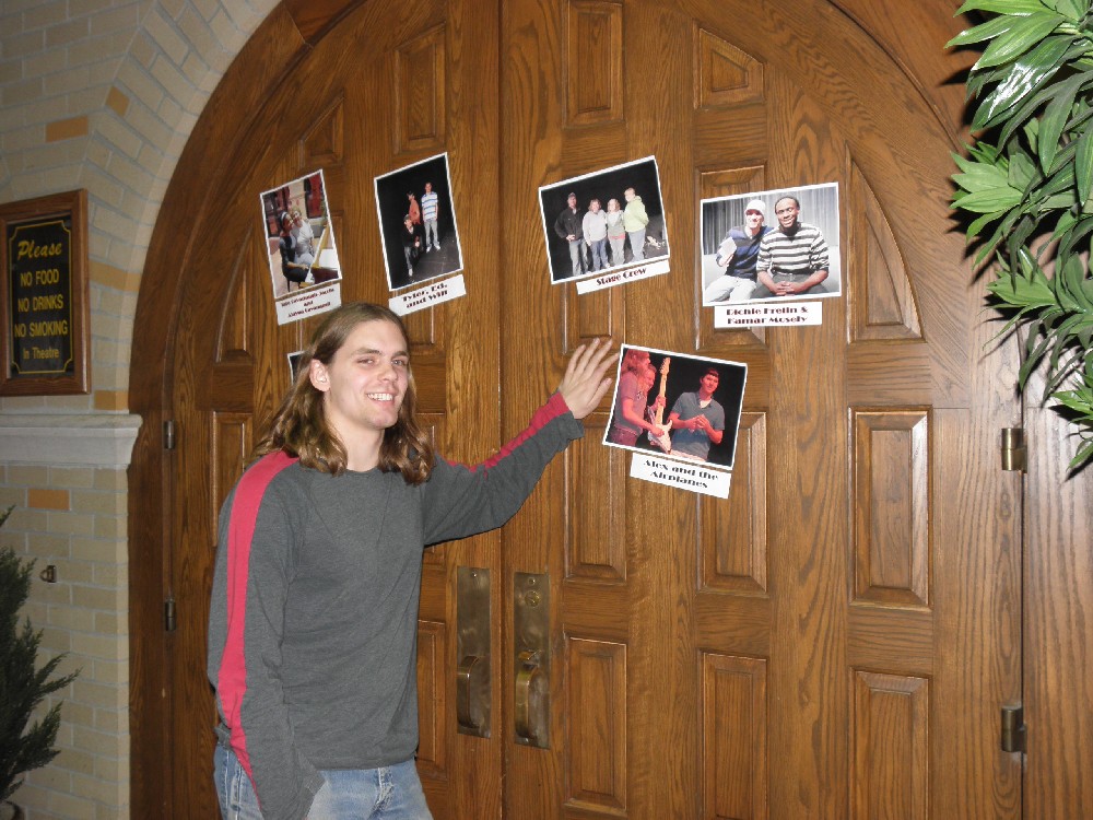 Me posing by our promo picture from last years show.