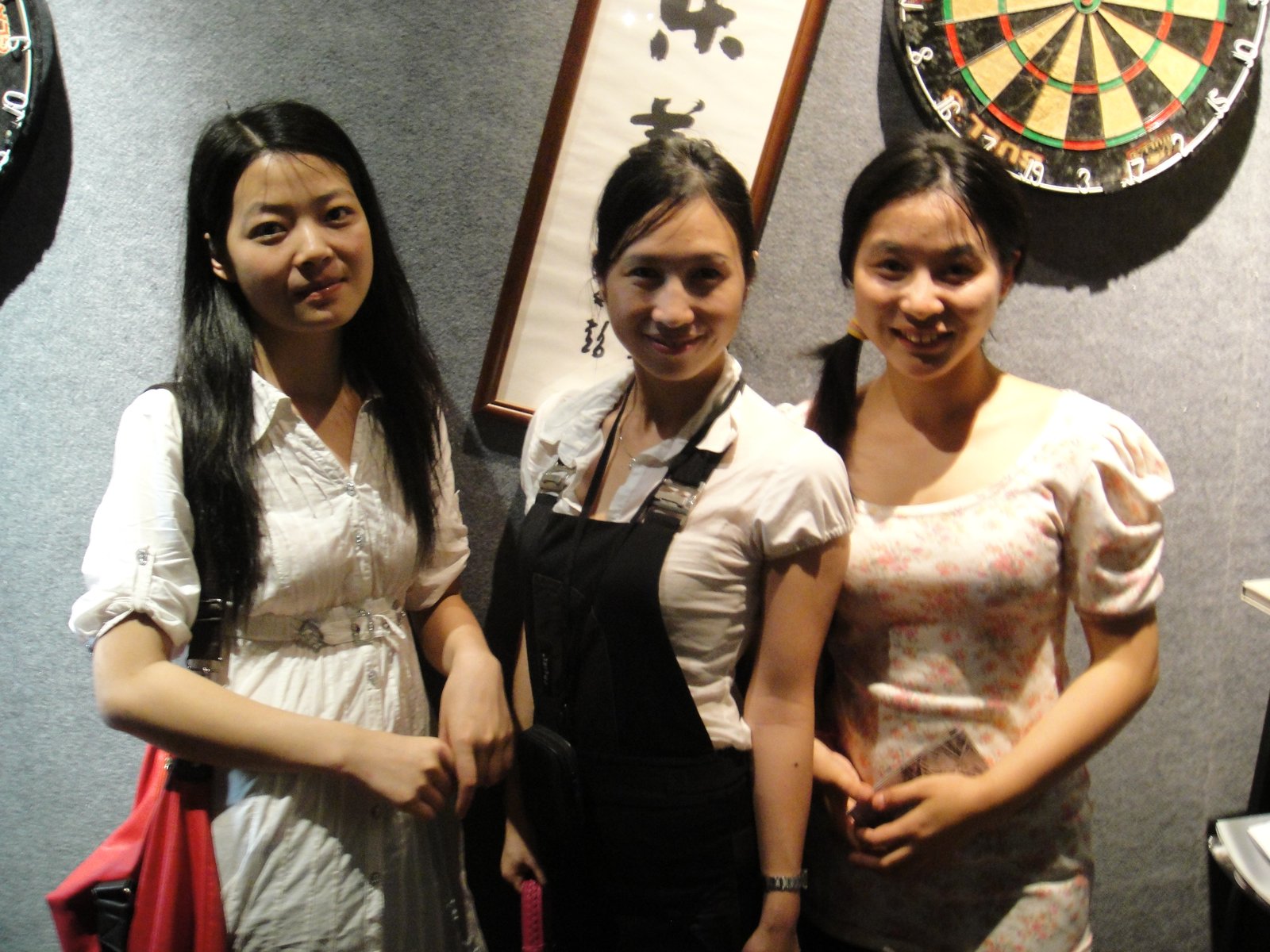 The three girls posing together