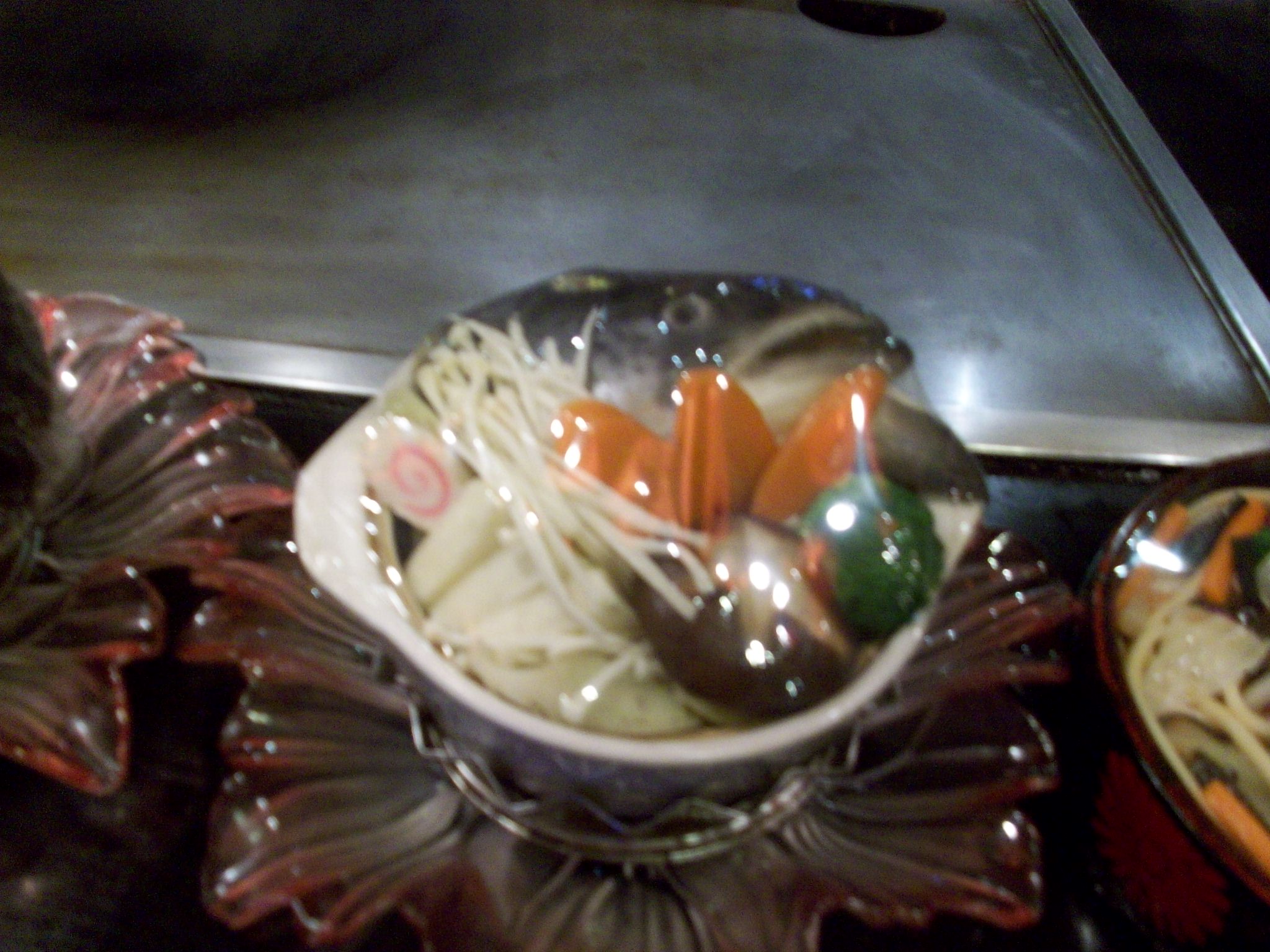 That is in fact a complete fish head in that bowl.  I haven&rsquo;t eaten anything qui that crazy yet, but I did have some raw salmon.