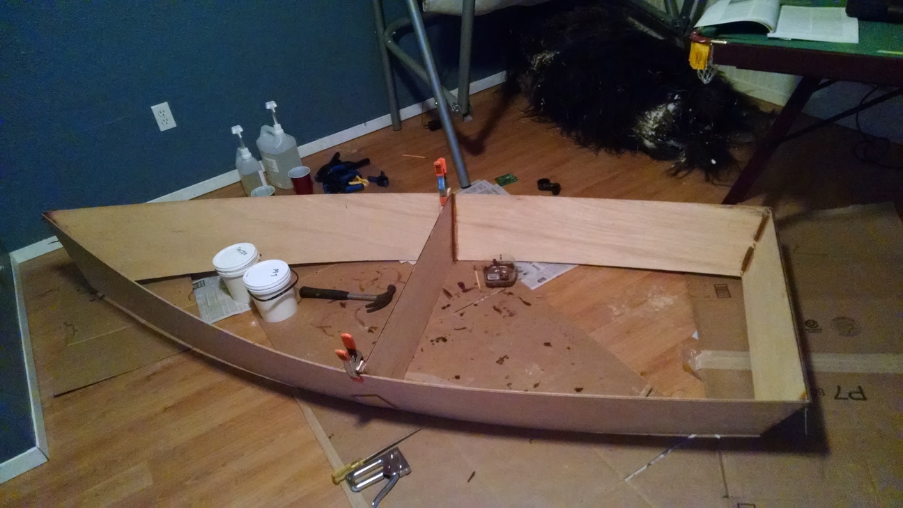 The 2X2 frame is epoxied to the plywood frame and they are epoxied into the hull.