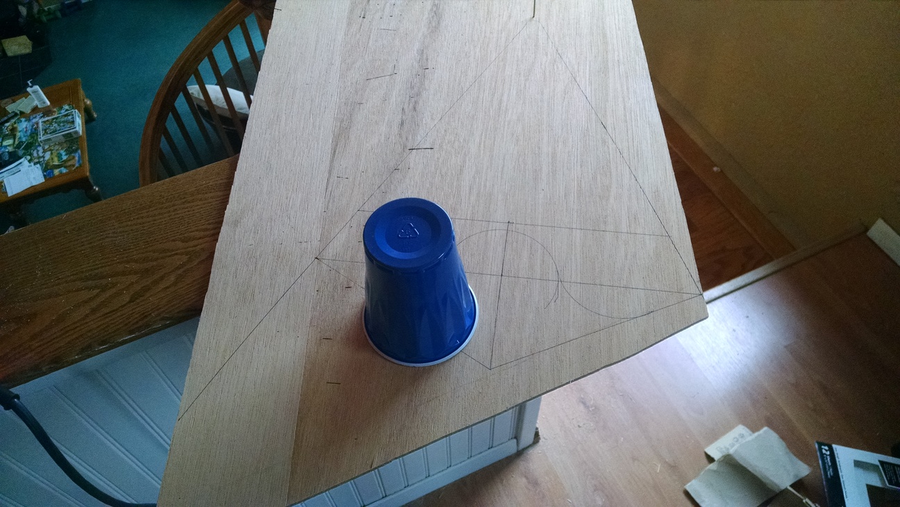 Tracing the breasthook from a solo cup.