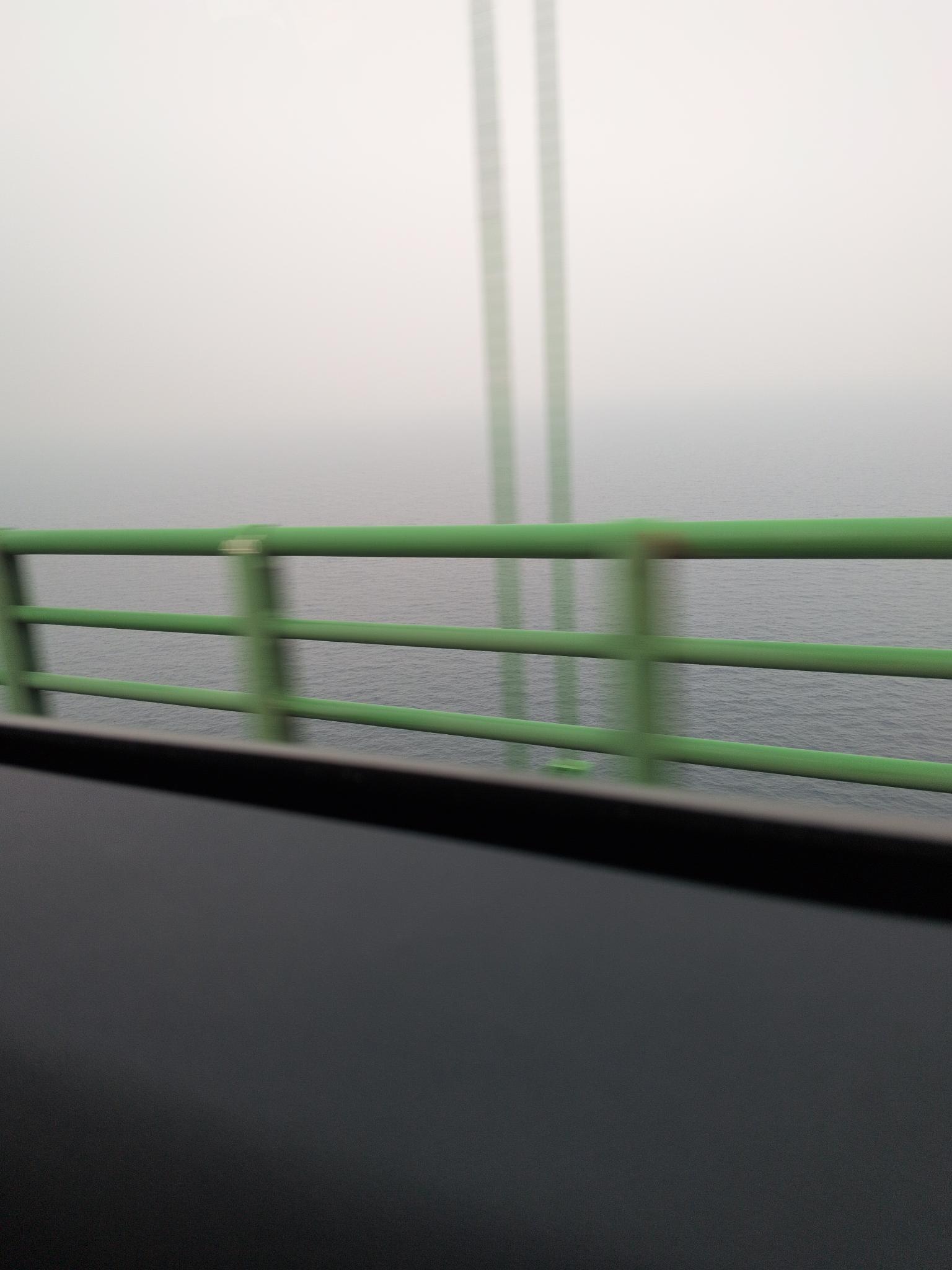 So smokey you can barely see the water. No visible islands.
