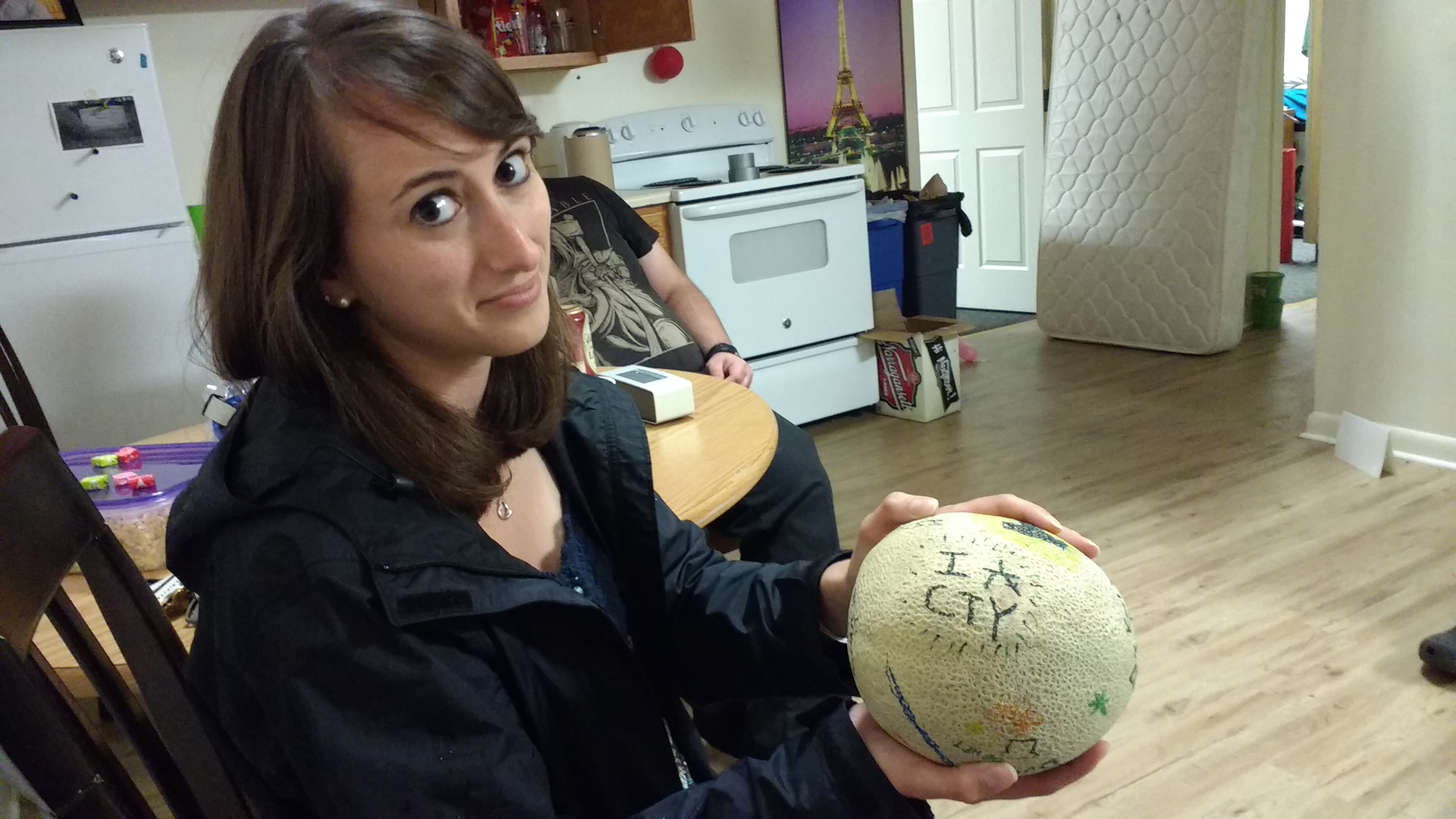 Rachel modelling my birthday cantaloupe