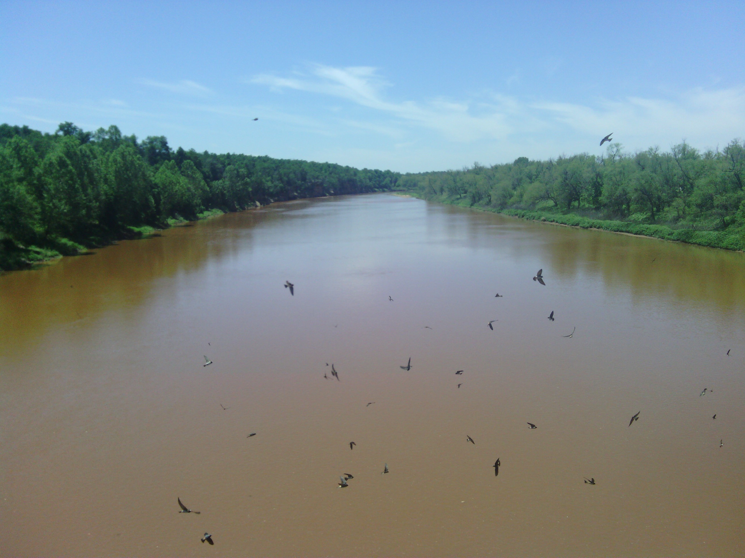 One of several rivers I crossed. I don&rsquo;t know if they are always this red or if it is from the rain.