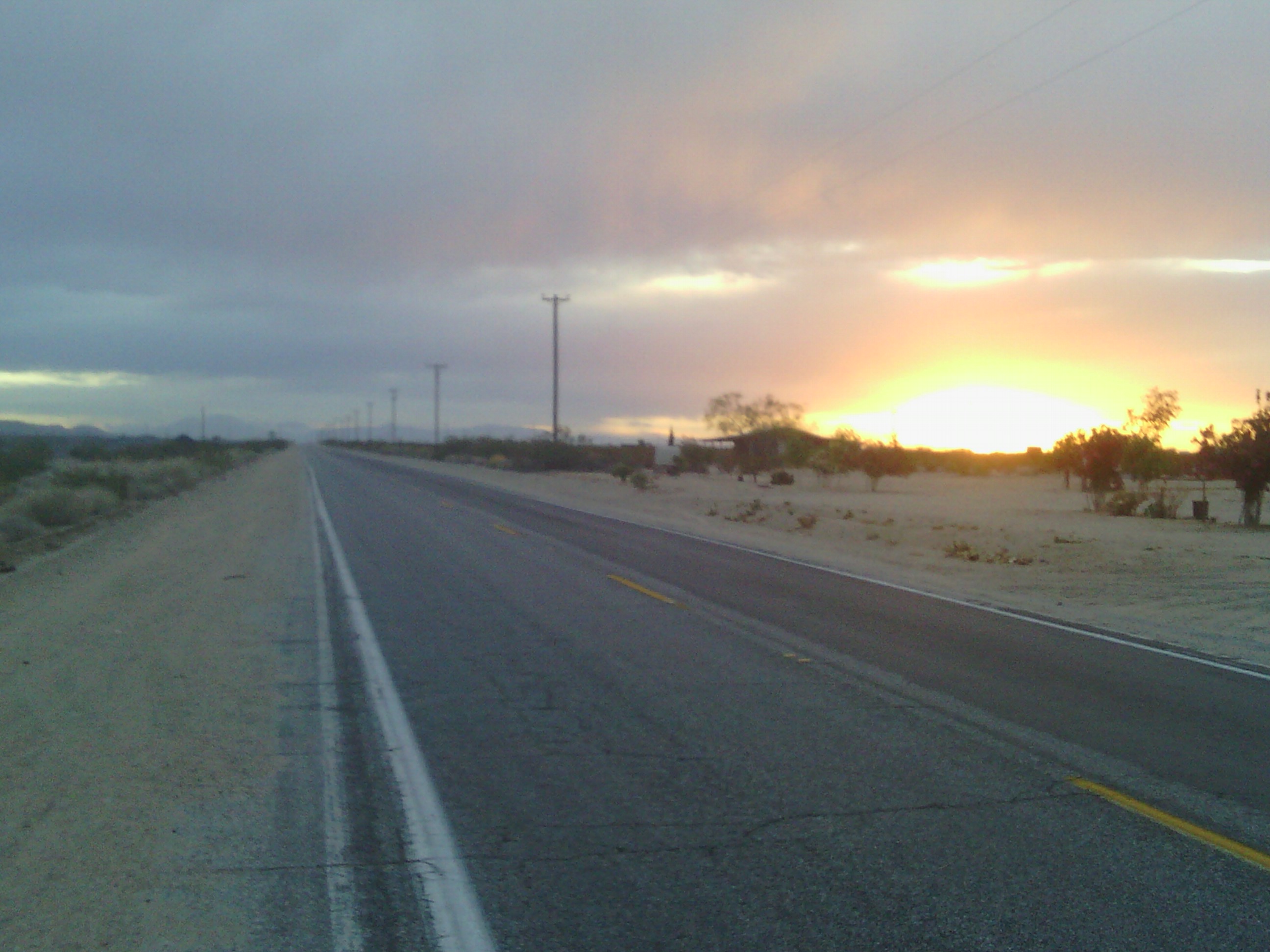 Sun setting over the desert as I rode to my campsite