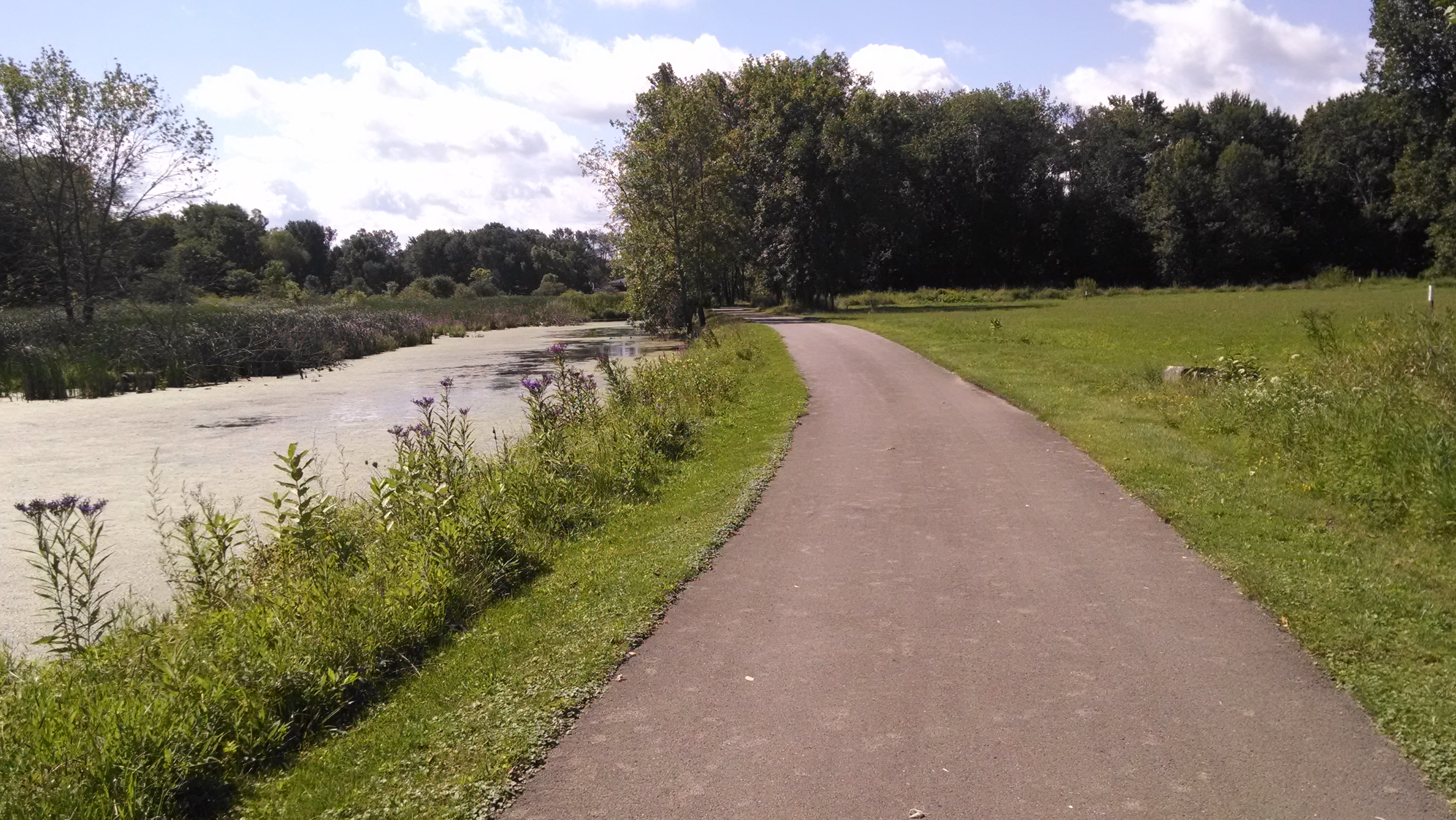 The first (paved) part of the path near a canal.