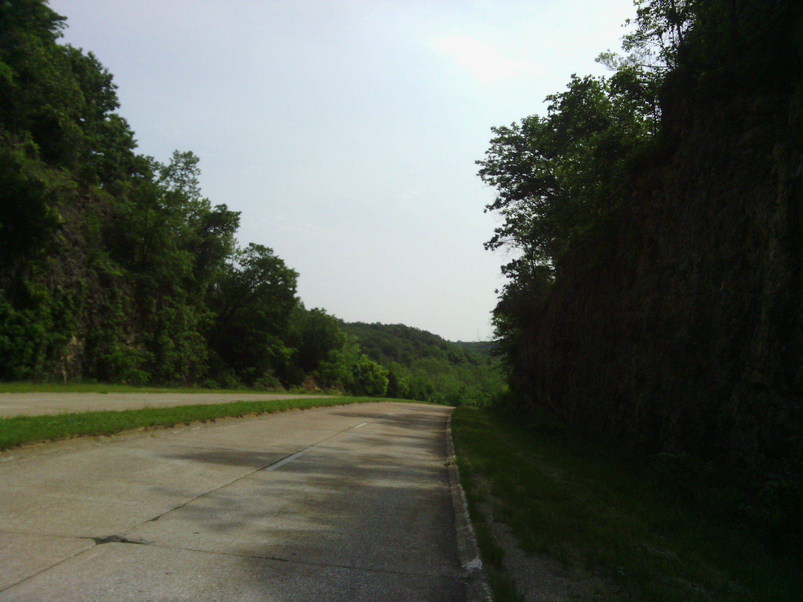 Riding between some cliffs at the beginning of the day