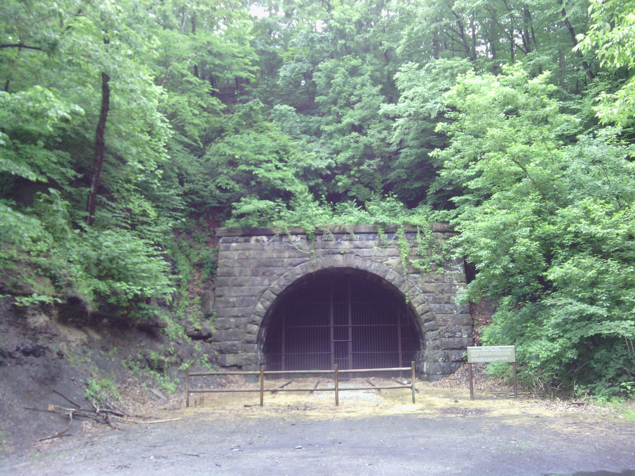 This old railroad tunnel is gated off. Looks like I&rsquo;m going up and over.