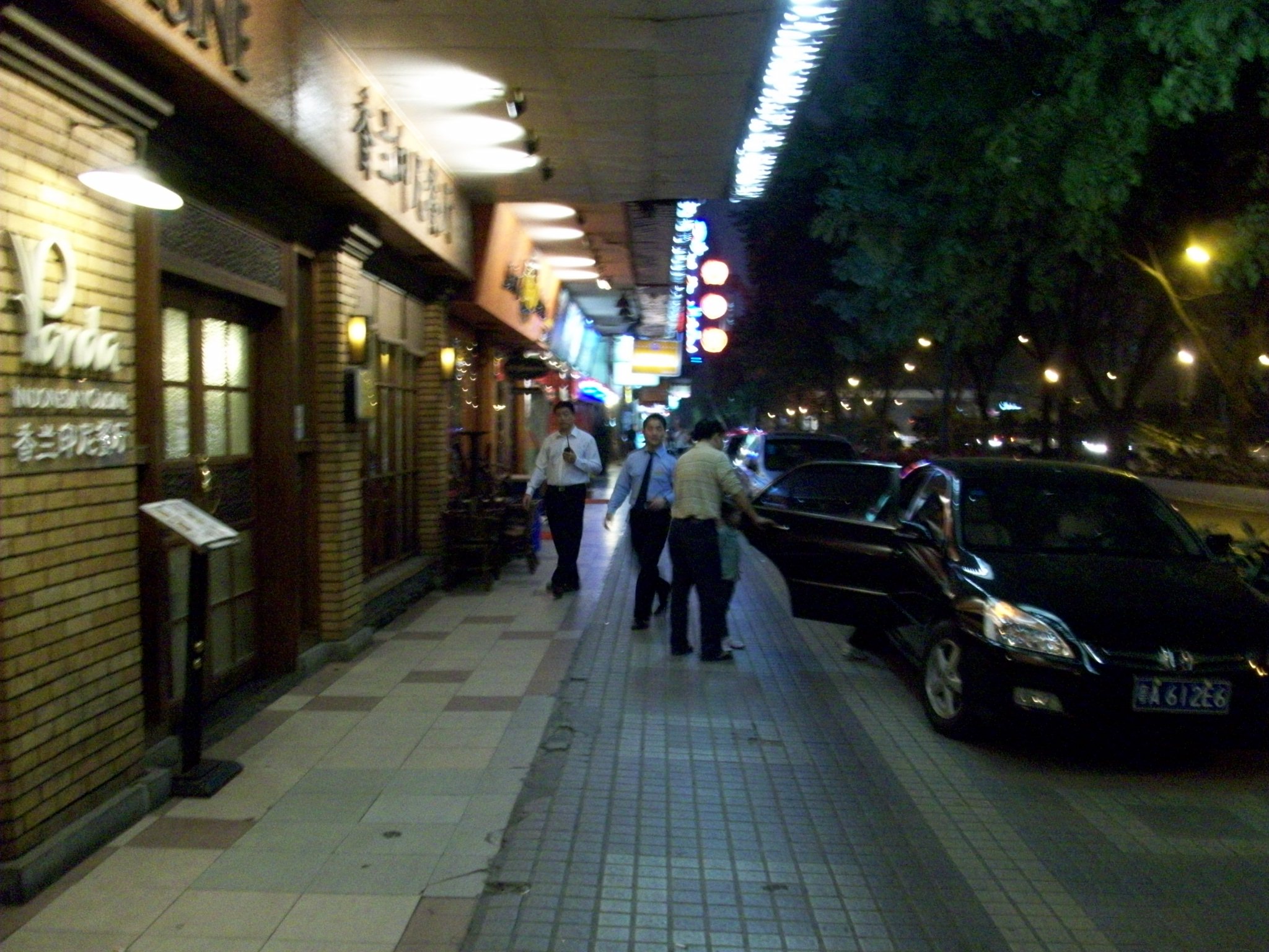 The cars park right on the sidewalk, and when one comes or goes, it just drives right where people are trying to walk.