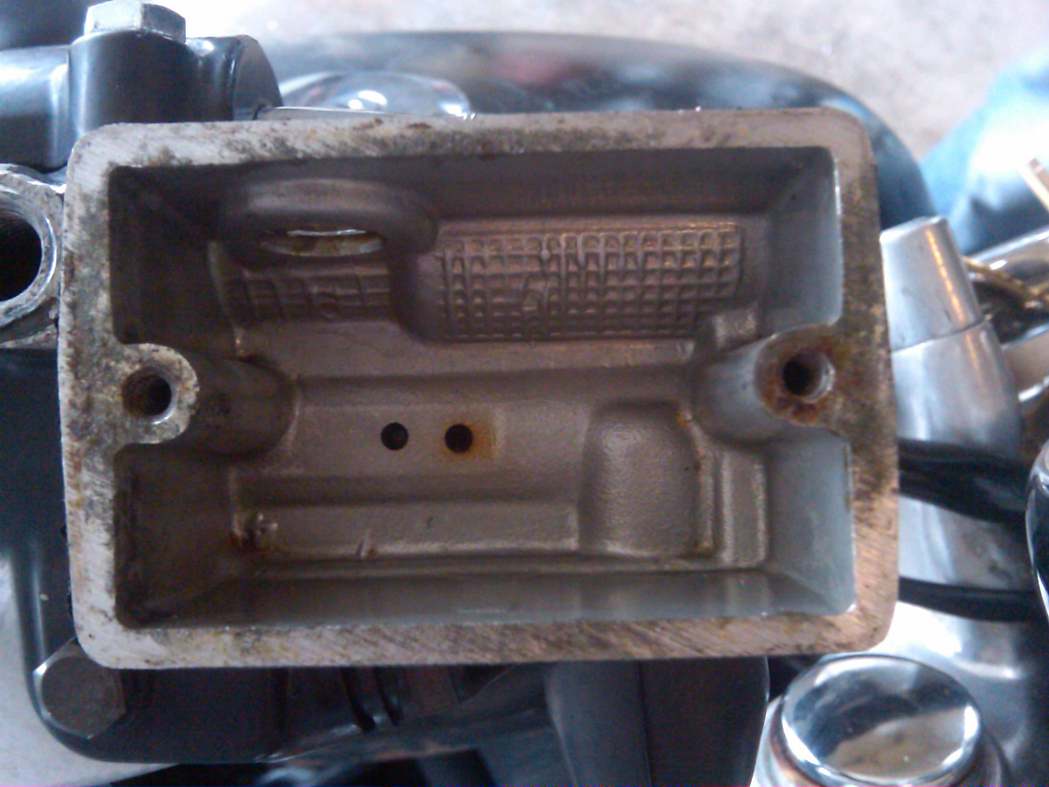 The inside of my master cylinder after pumping out the old fluid and wiping it clean.