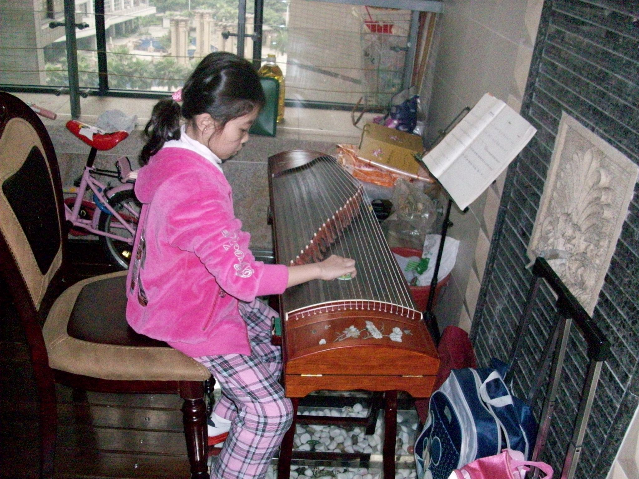 This is one of my students.  She played a few songs for me and is pretty impressive.