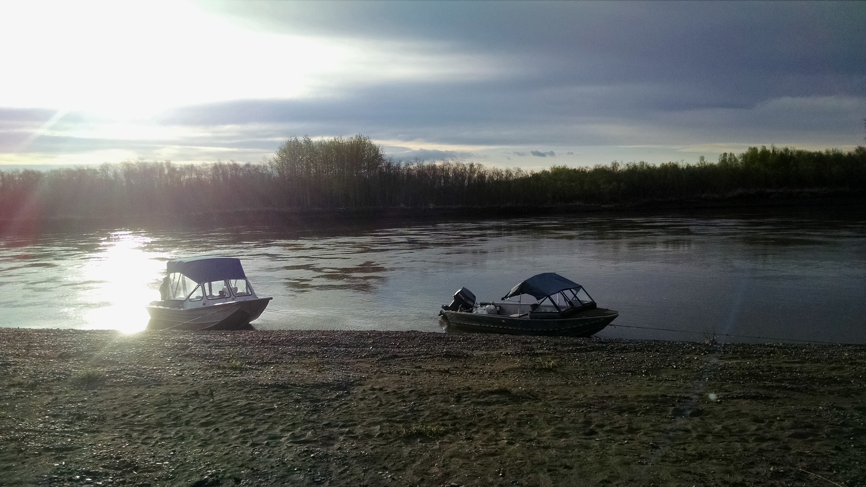 Our boats tied off at camp