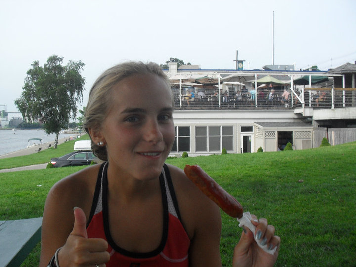 Sarah eating a Pronto Pup.