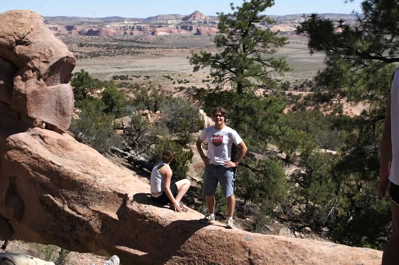 Standing on a natural stone bridge