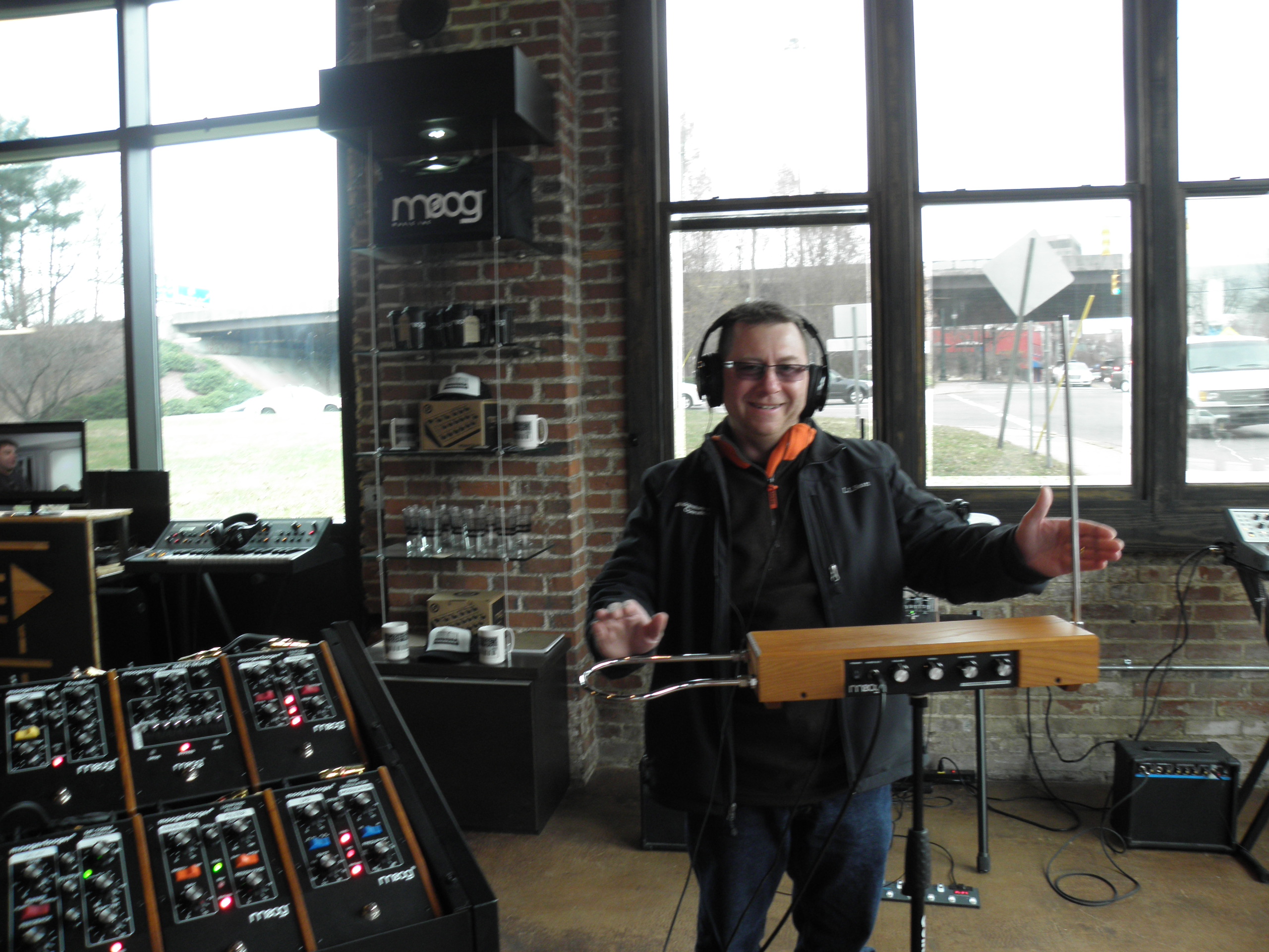 Dad playing theramin at the Moog synthesizer factory