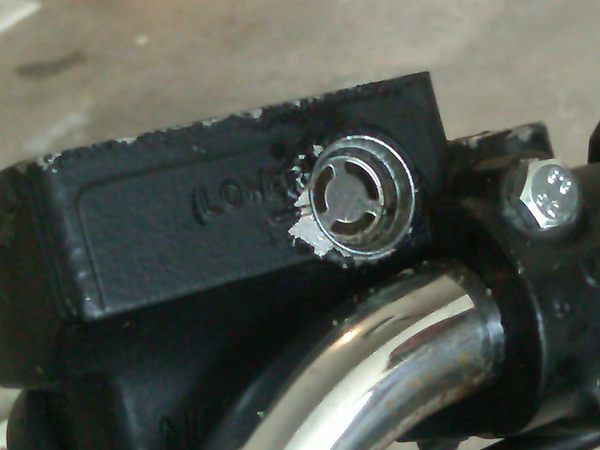 The lens hole after it has been cleaned with a knife and brake cleaner