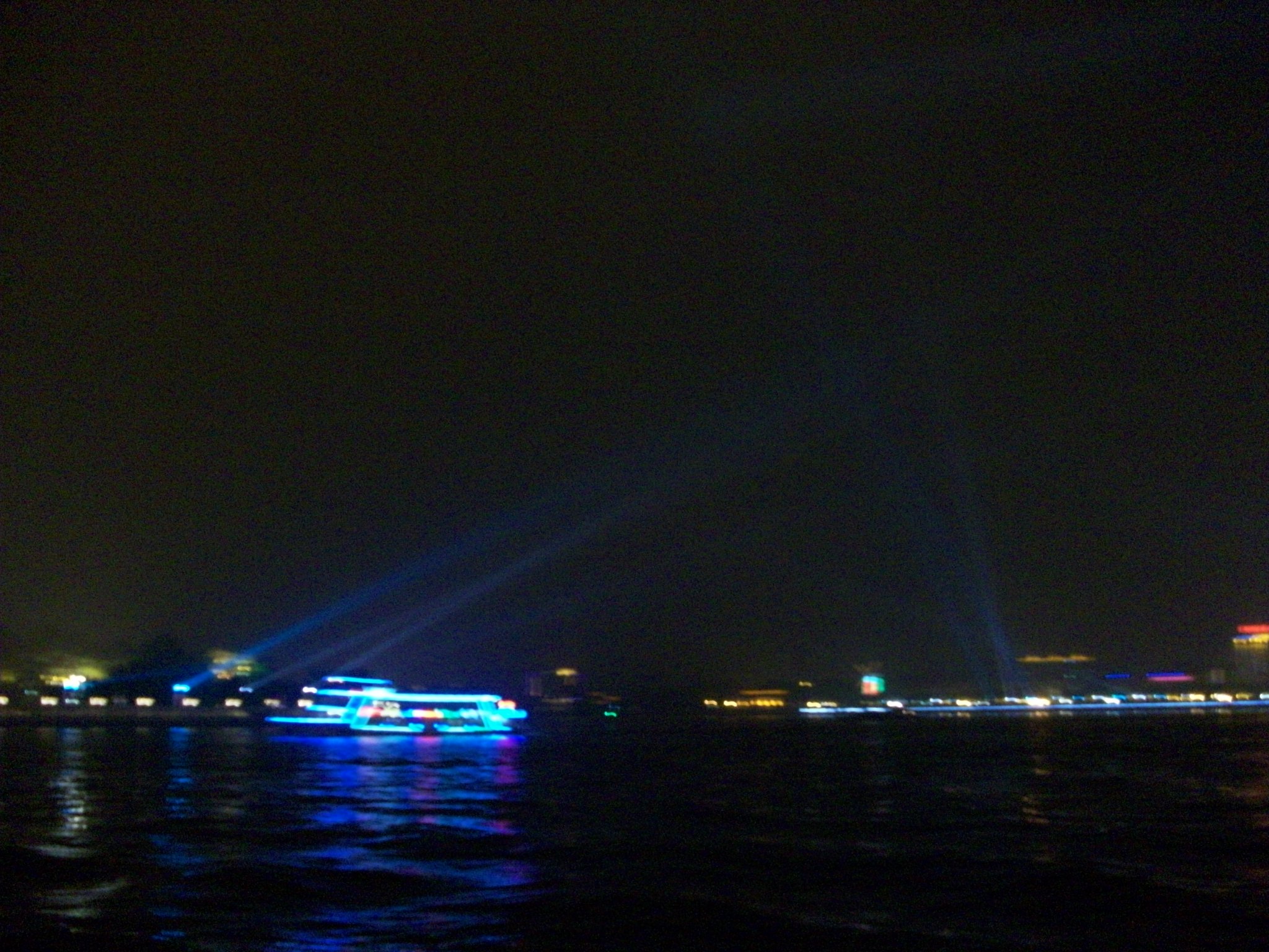 Guangzhou is on the river delta.  Where these two branches come together there are huge spotlights lighting the sky.