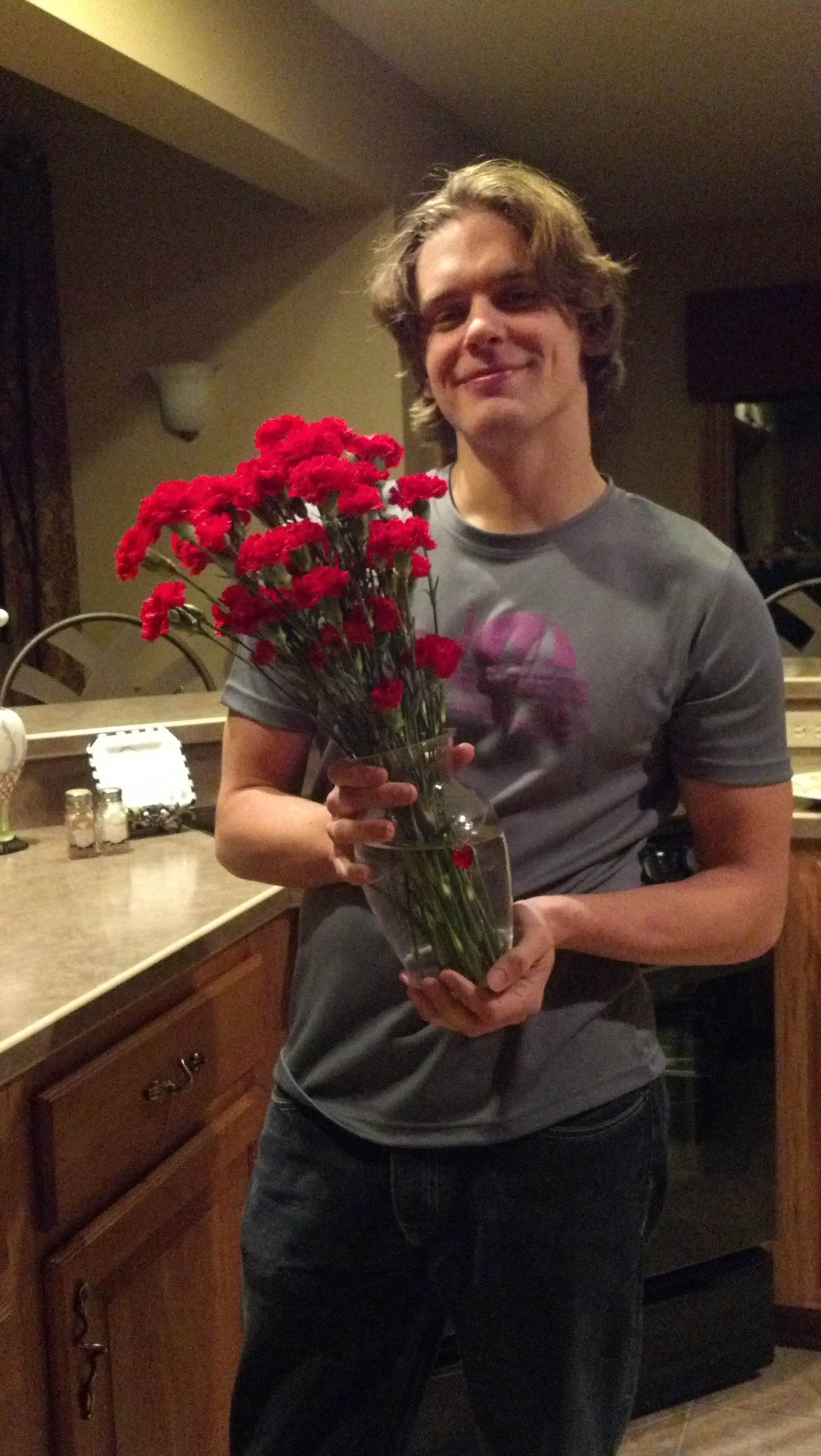 I met her at the airport with flowers.