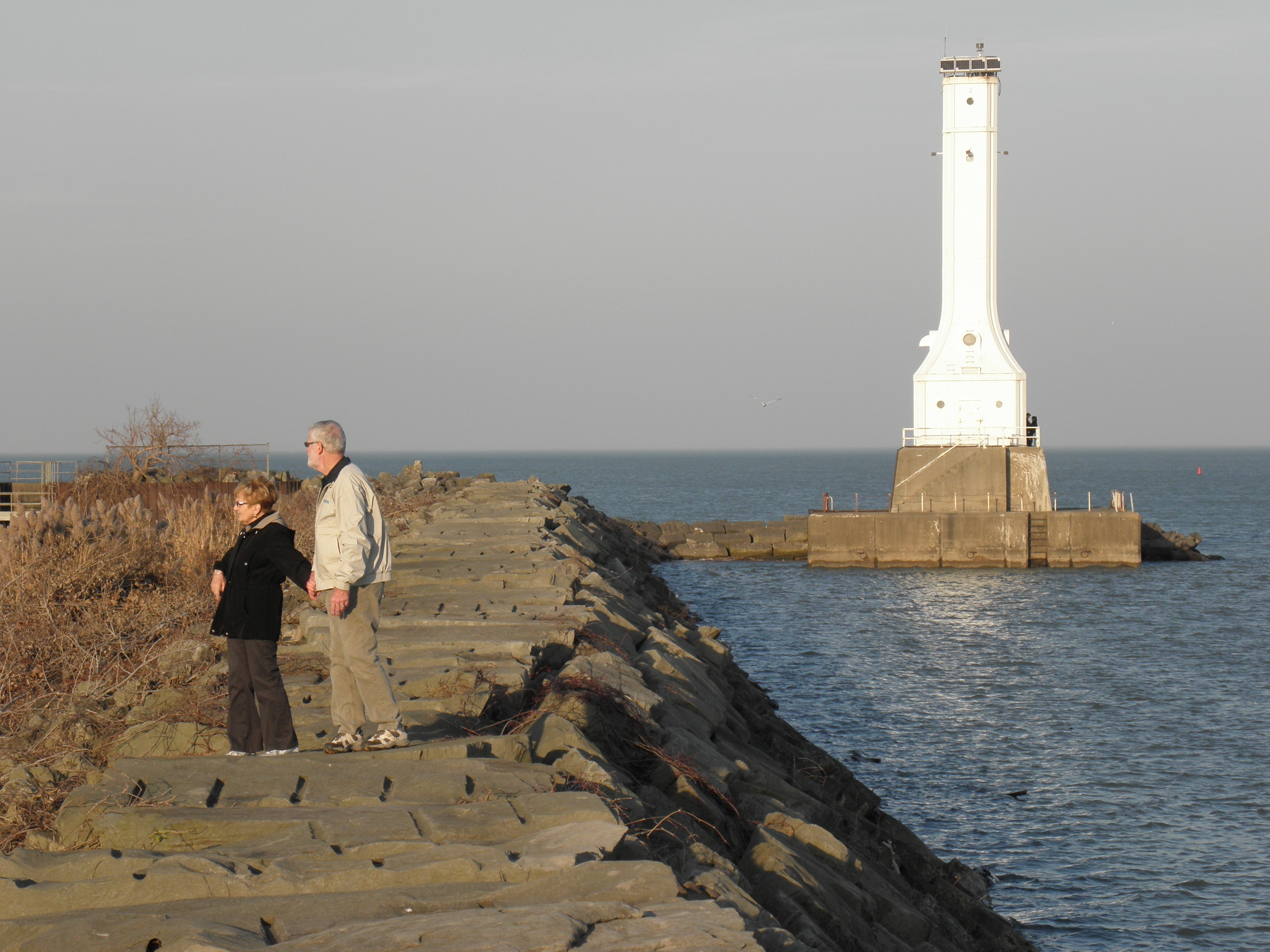 Here is a slightly modified version of the previous.  I removed the fisherman sitting on the base of the lighthouse.
