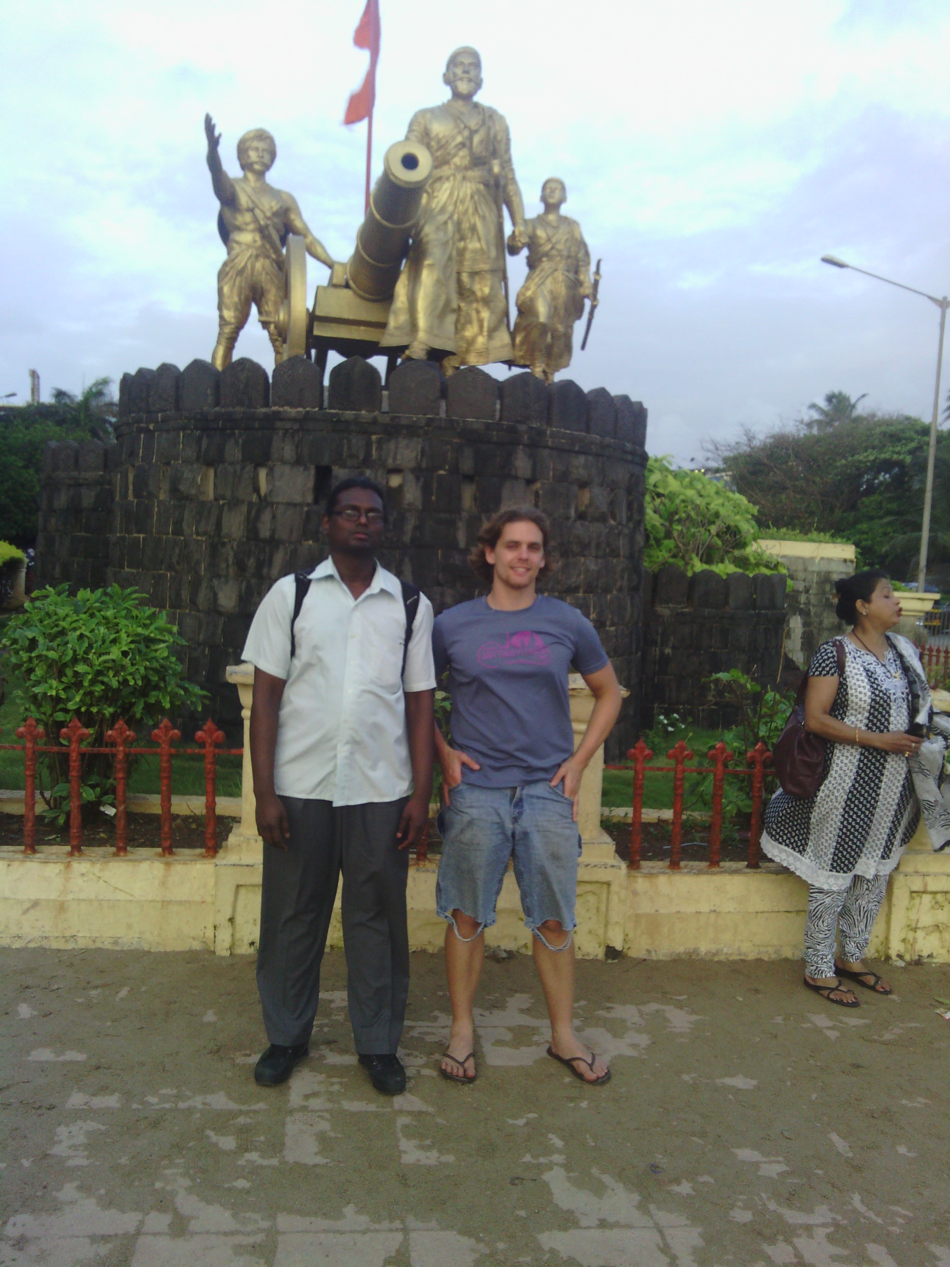 The two of us in front of a statue.