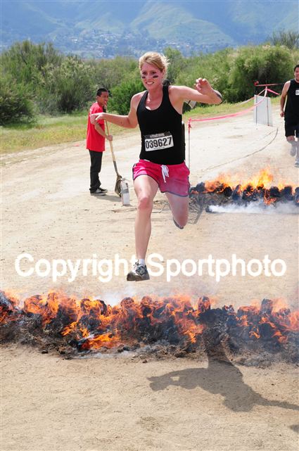 Annika leaping the fire