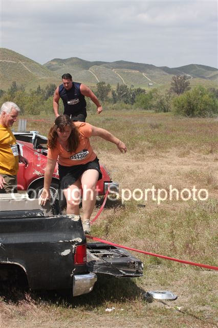 Carrie traversing the junkyard